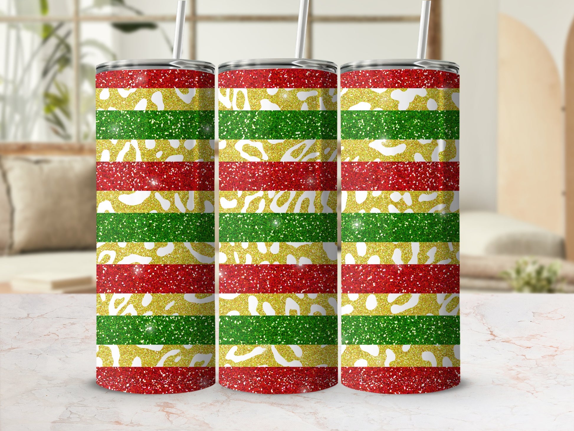 Three glitter tumblers with red, green, and gold stripes.