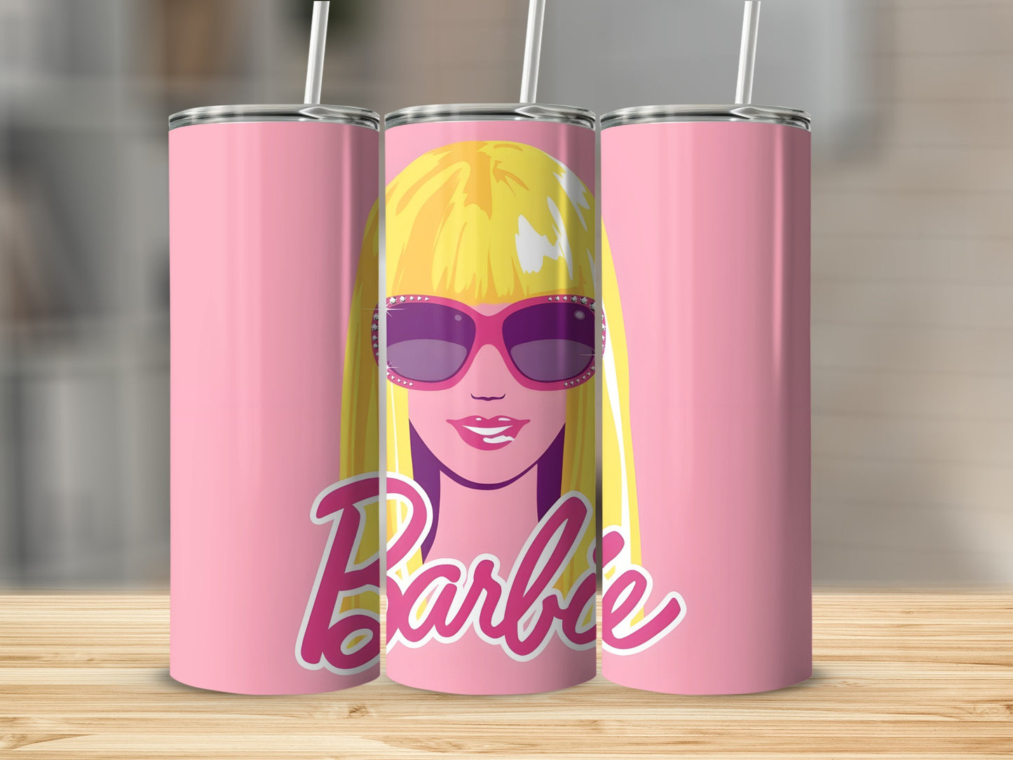 Pink Barbie tumbler with blonde hair, sunglasses, and signature logo.