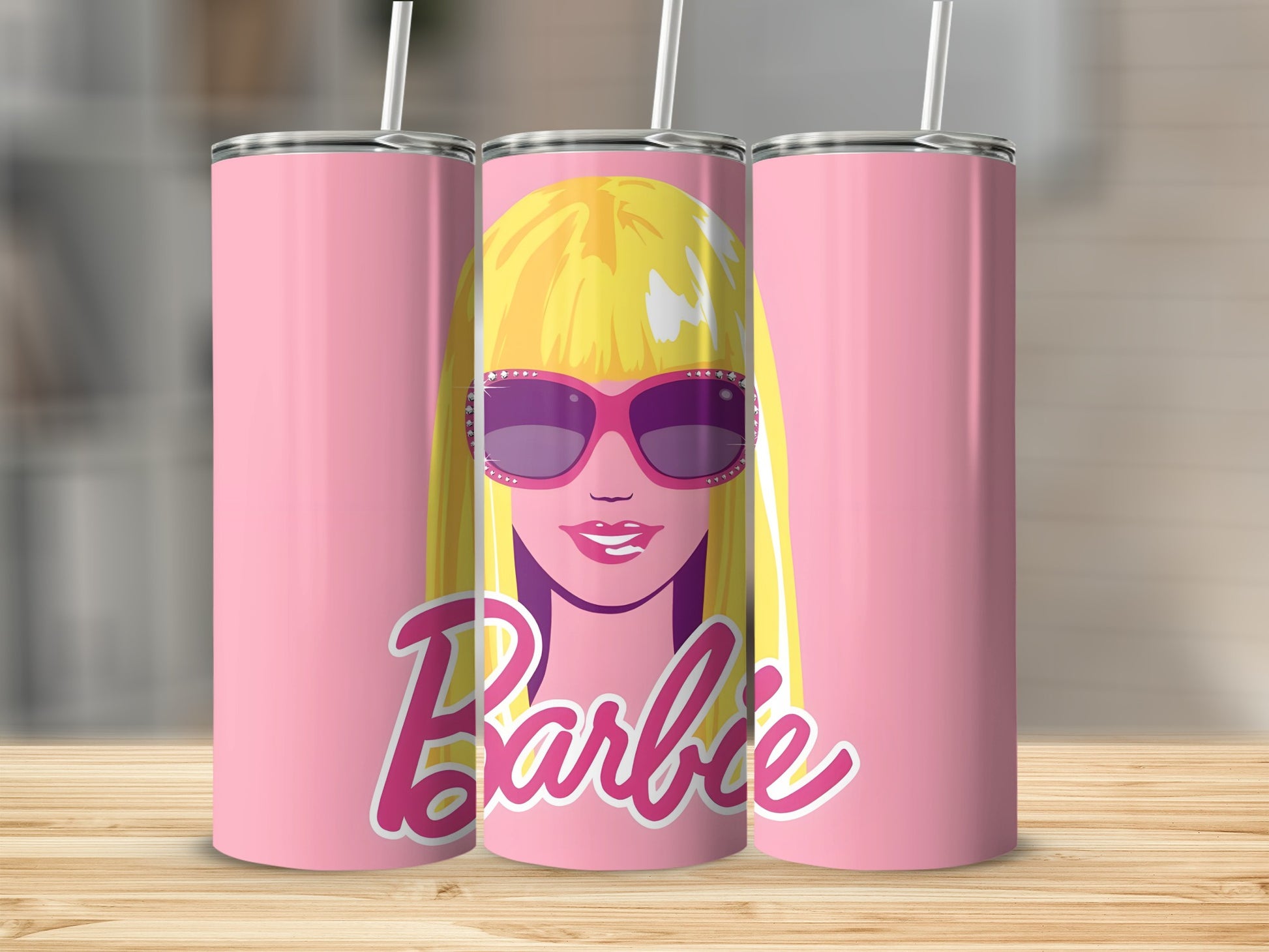 Pink Barbie tumbler with blonde hair, sunglasses, and signature logo.