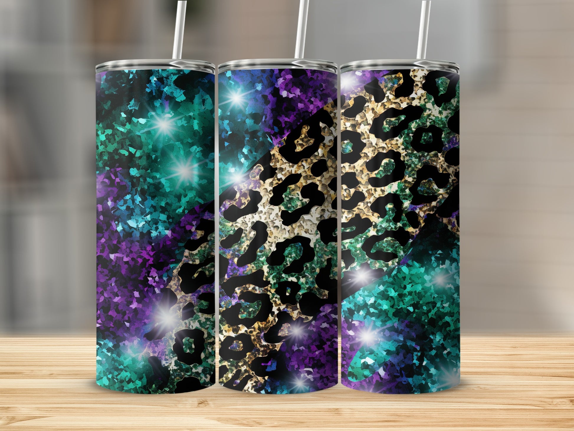 Three tumblers with purple and teal glitter and leopard print designs.