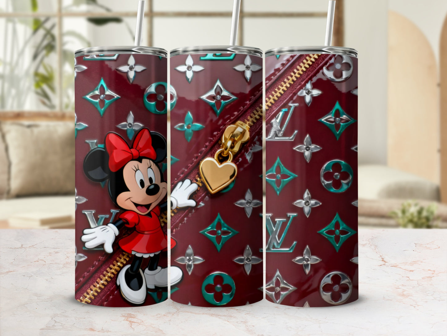 Minnie Mouse on a burgundy tumbler with LV pattern and gold zipper.