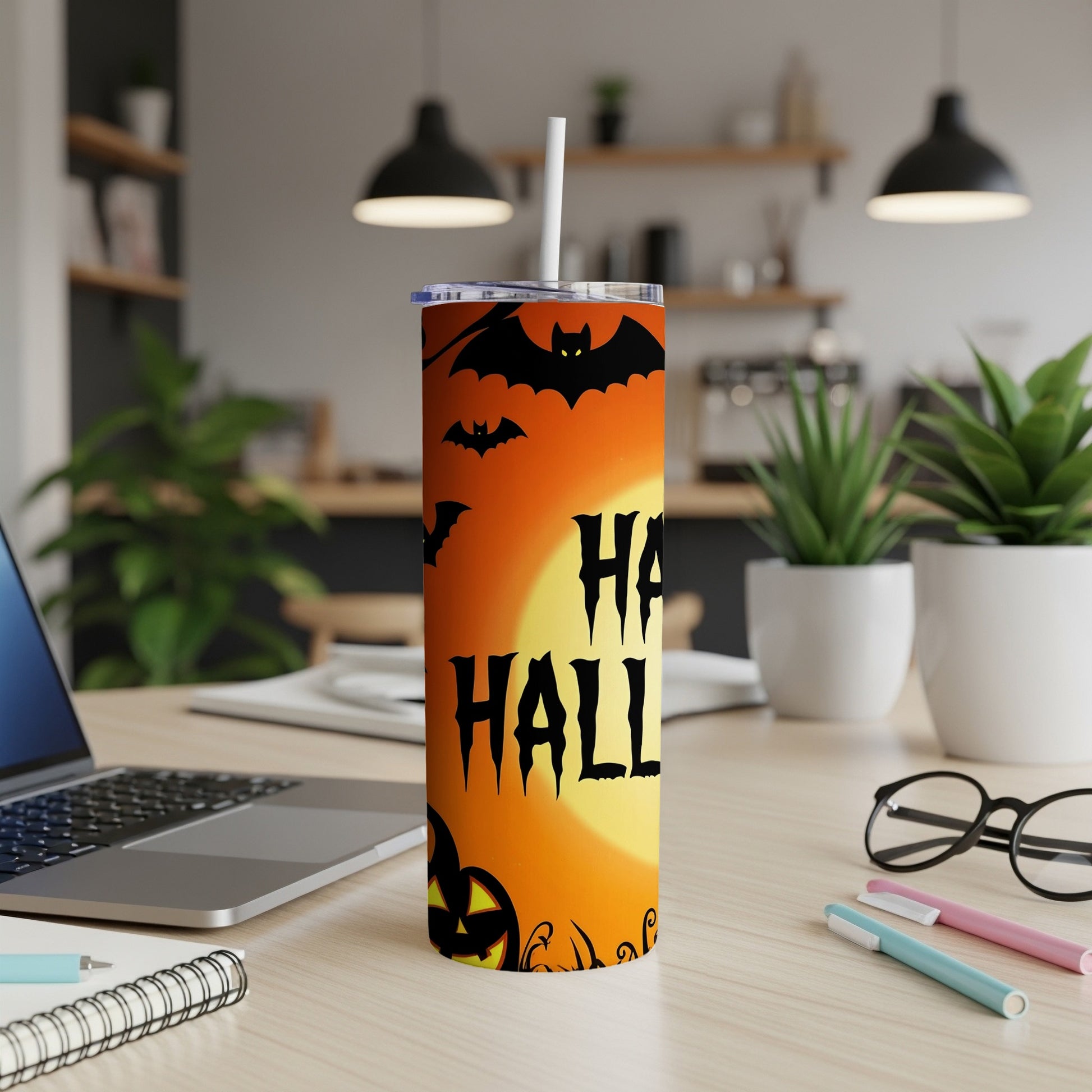 Halloween tumbler with bats, pumpkins, and text "Happy Halloween".