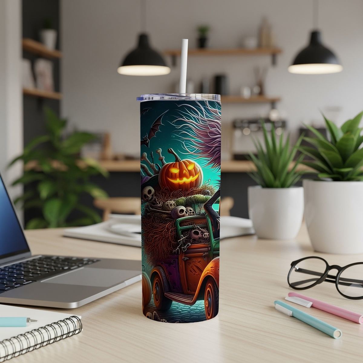 Tumbler with Halloween design of a truck overflowing with pumpkins and skulls.