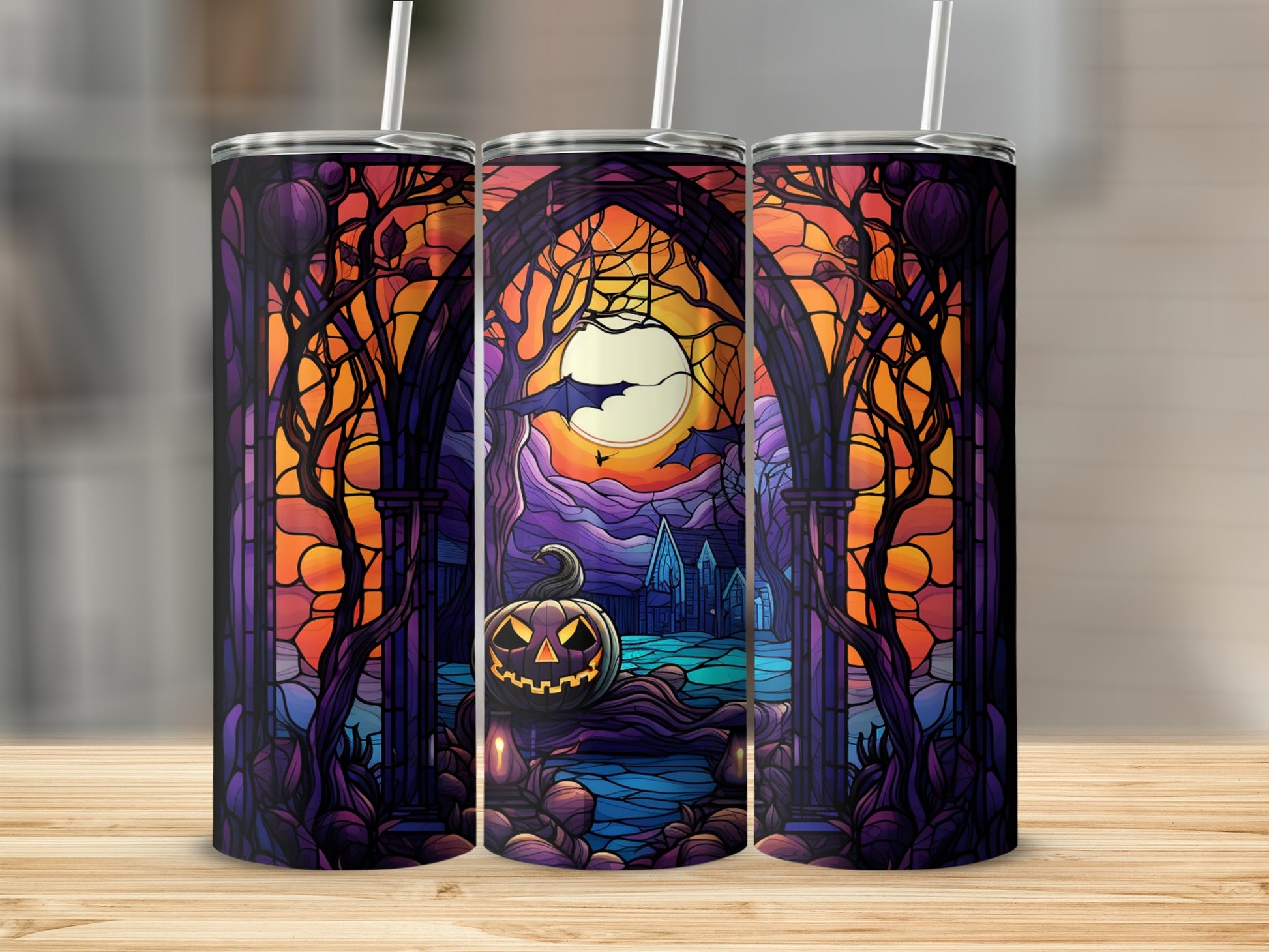 Halloween stained glass tumbler with jack-o'-lantern and haunted castle.