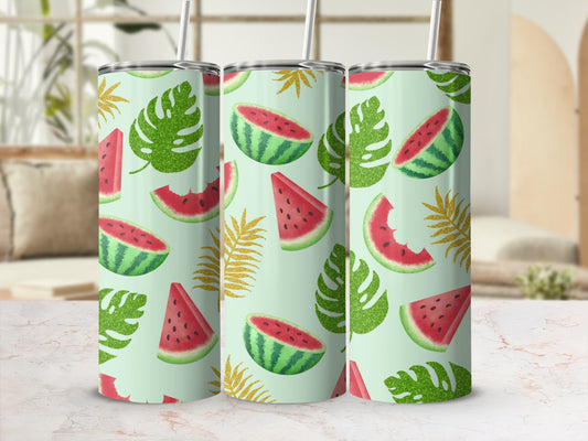 Three tumblers with watermelon slices and glitter palm leaves on a light green background.