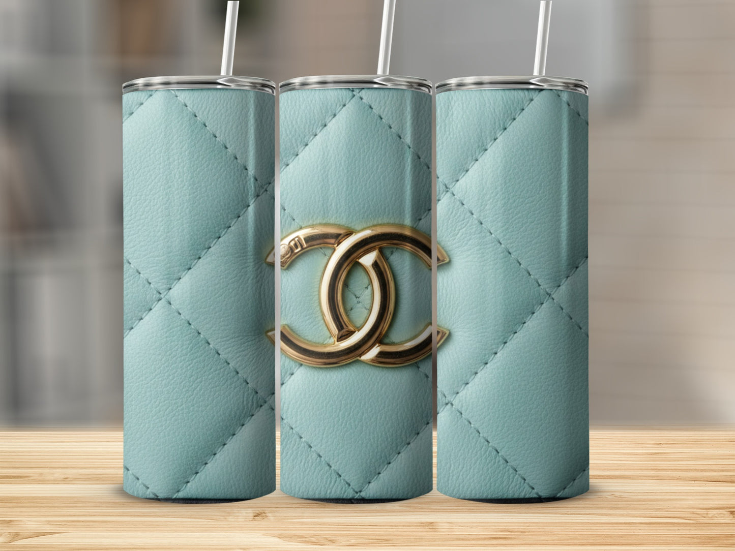 Gold Logo On Teal Quilted Surface Design Tumblers