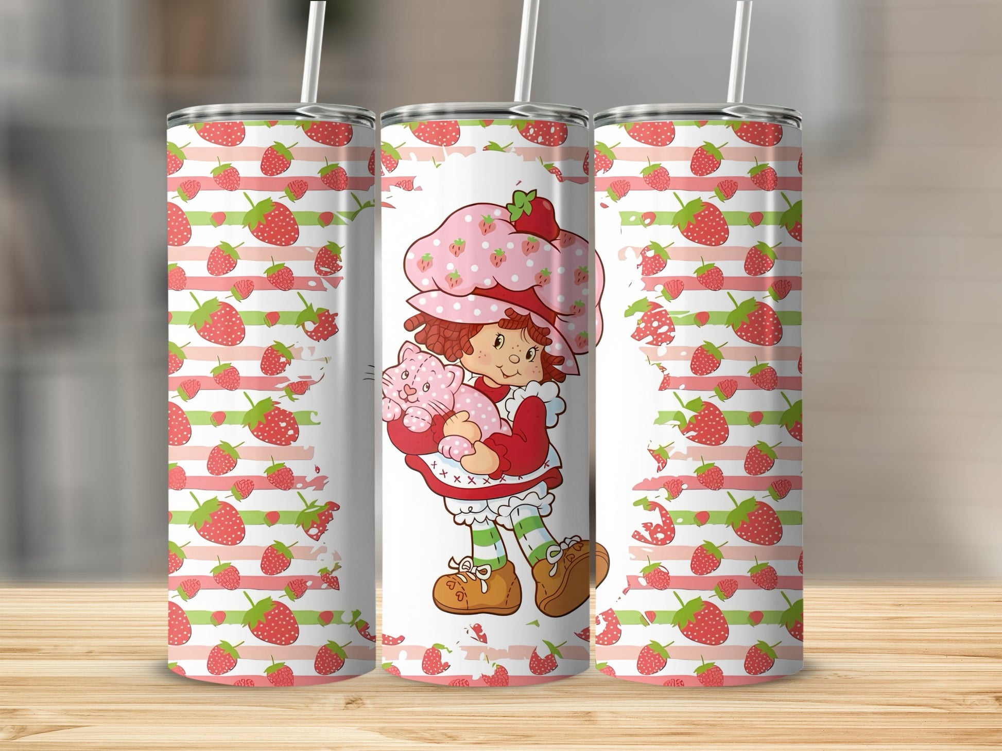Strawberry Shortcake character holding a pink cat, with strawberry and stripe pattern.