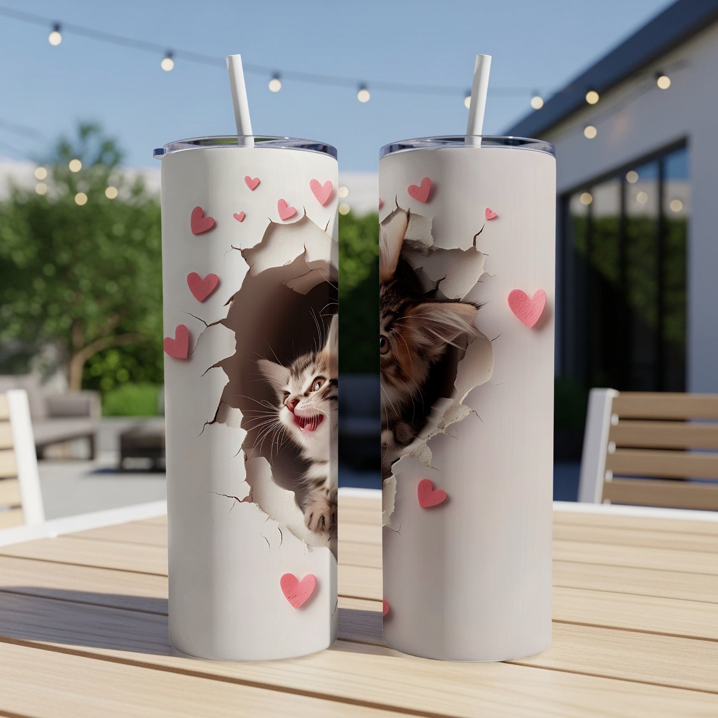 Cute kitten peeking through a torn heart-shaped opening on a tumbler.