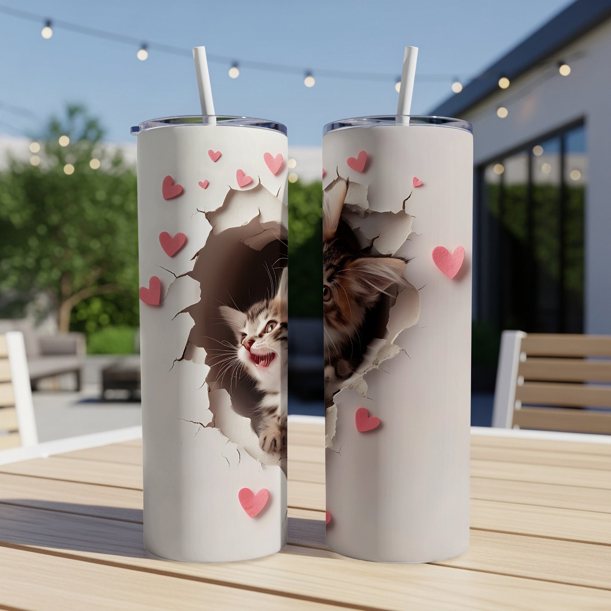 Cute kitten peeking through a torn heart-shaped opening on a tumbler.