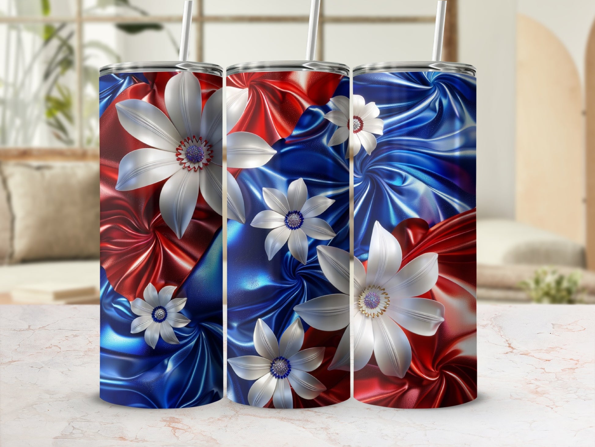 Red and blue floral pattern on three tumblers.