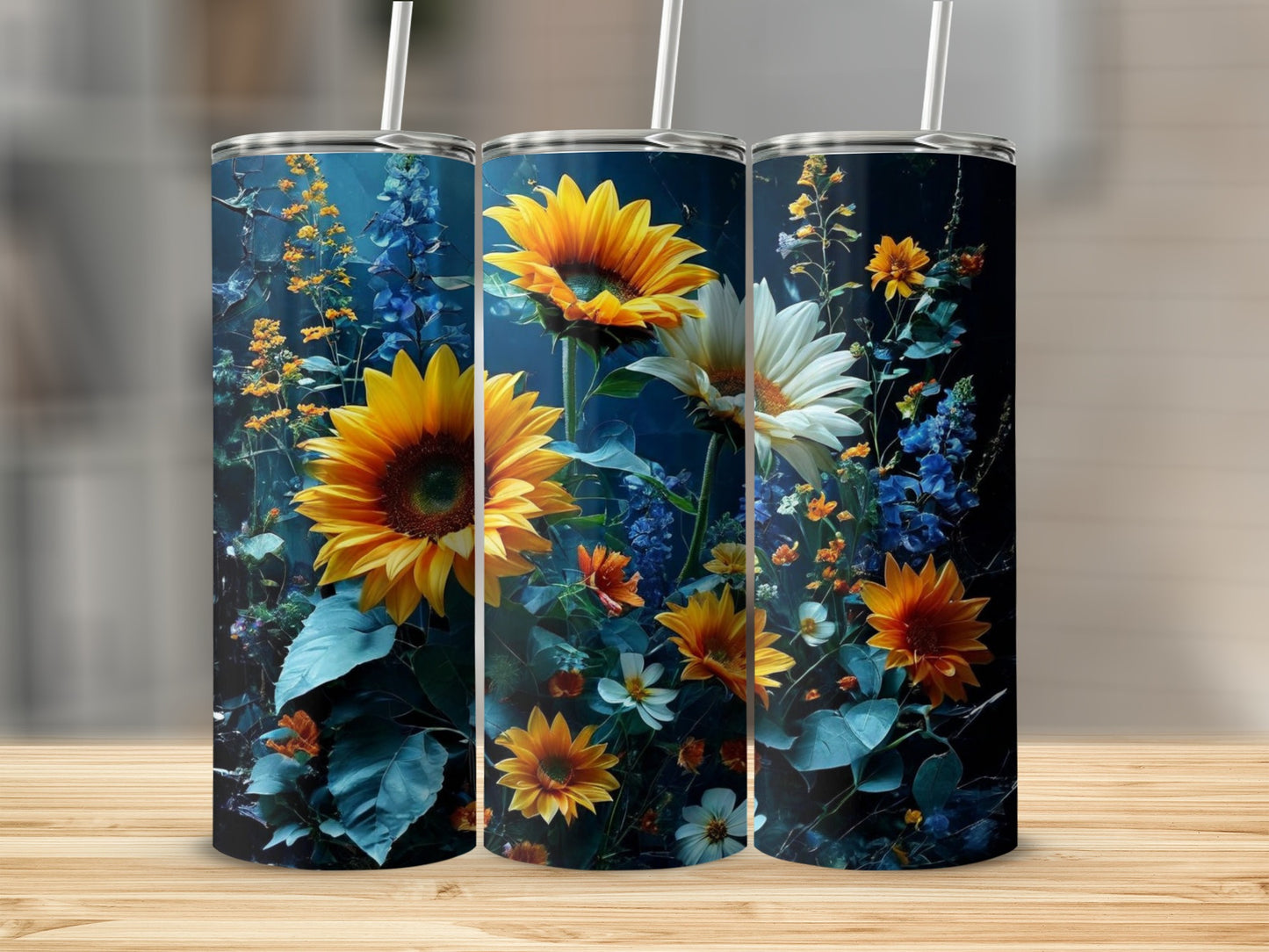 Three tall tumblers featuring sunflowers and wildflowers on a dark floral background.