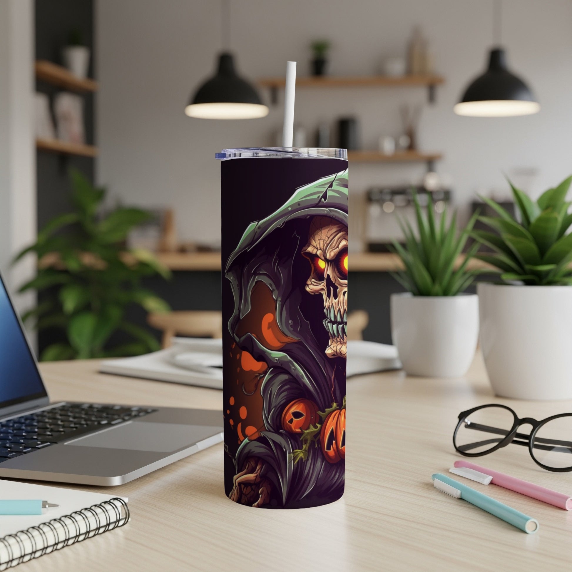 Grim Reaper with pumpkins design on a tall tumbler with a straw.