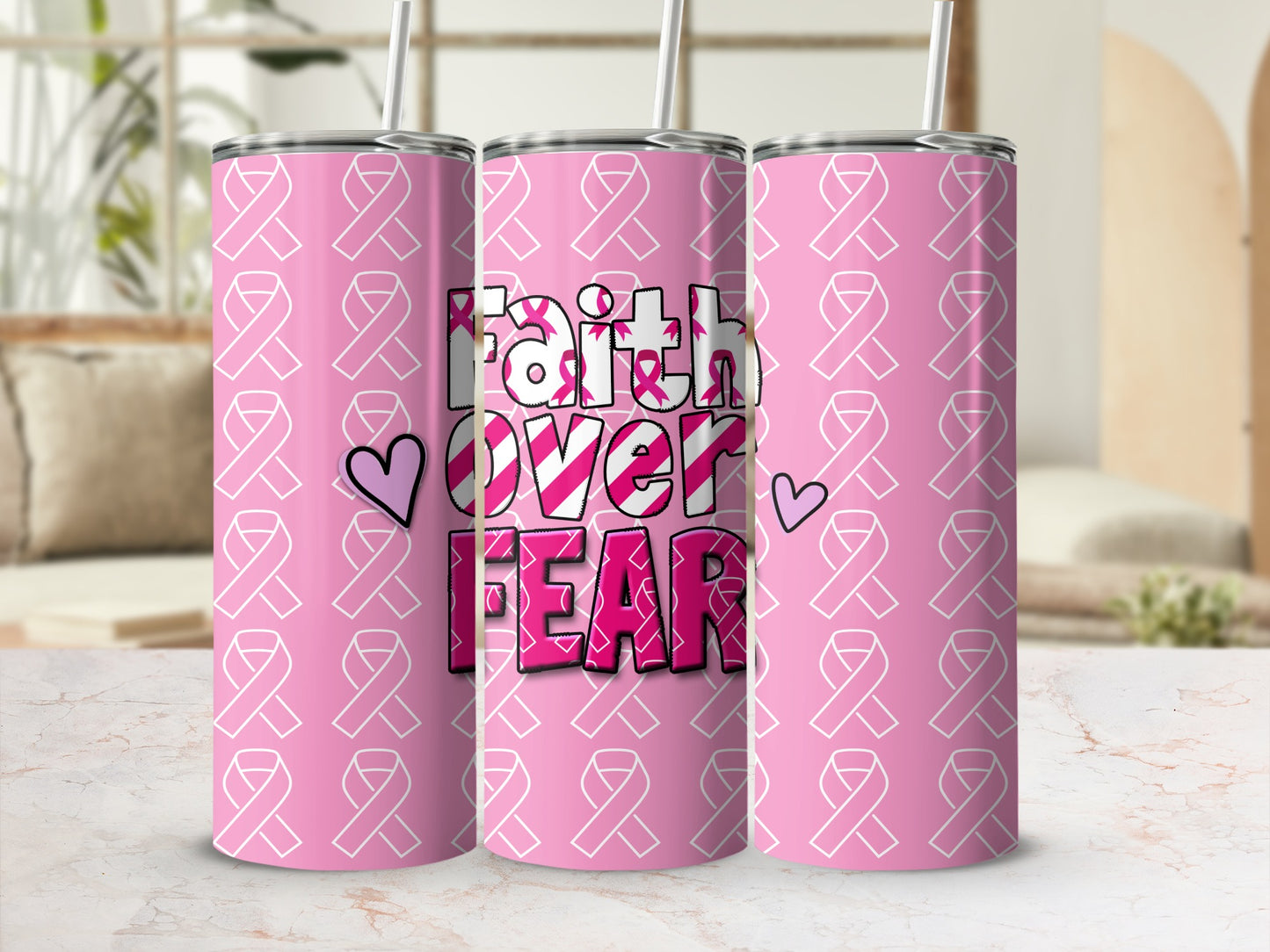 Pink tumbler with "Faith Over Fear" text and breast cancer awareness ribbons.