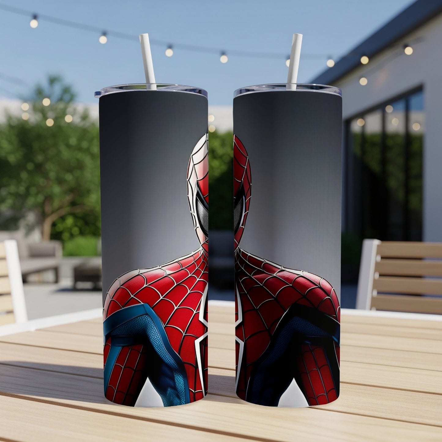 Spider-Man's iconic red and blue suit on two matching tumblers with straws.