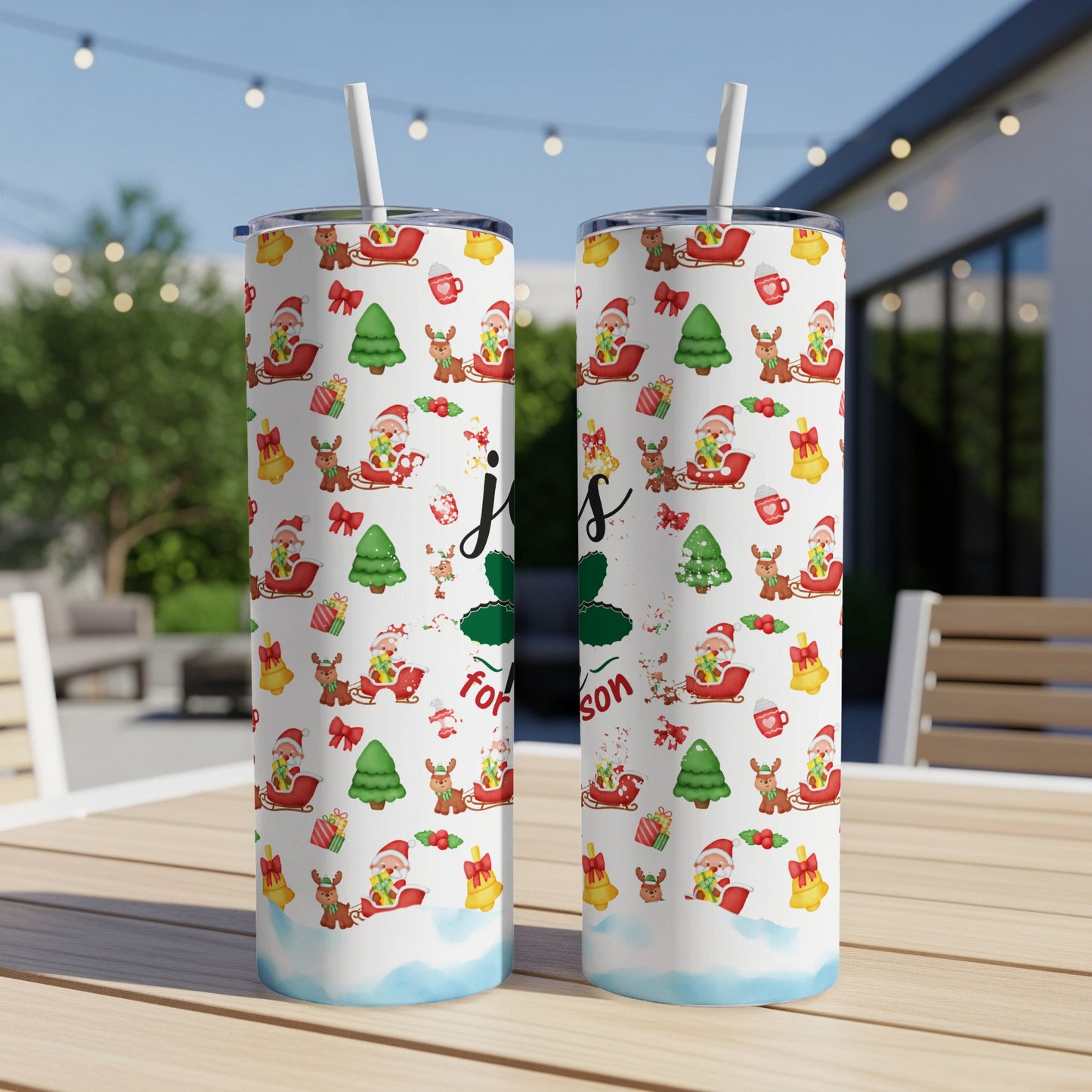 Two Santa and reindeer patterned tumblers with "Joy for the Holidays" text.
