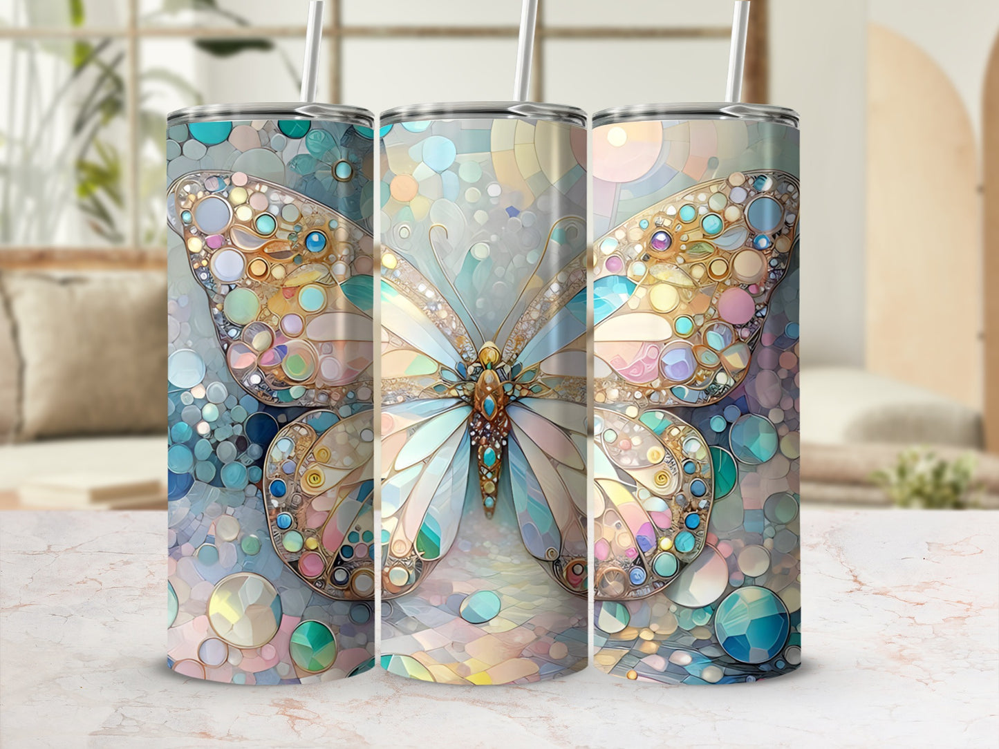 Three tumblers with stained glass butterfly and geometric pattern designs.