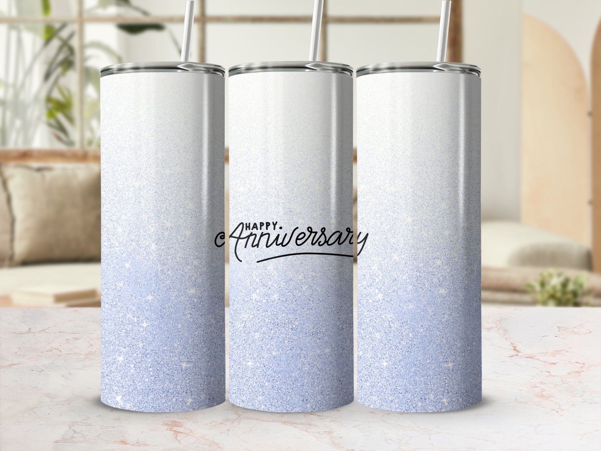 White gradient tumbler with "Happy Anniversary" text and blue glitter.