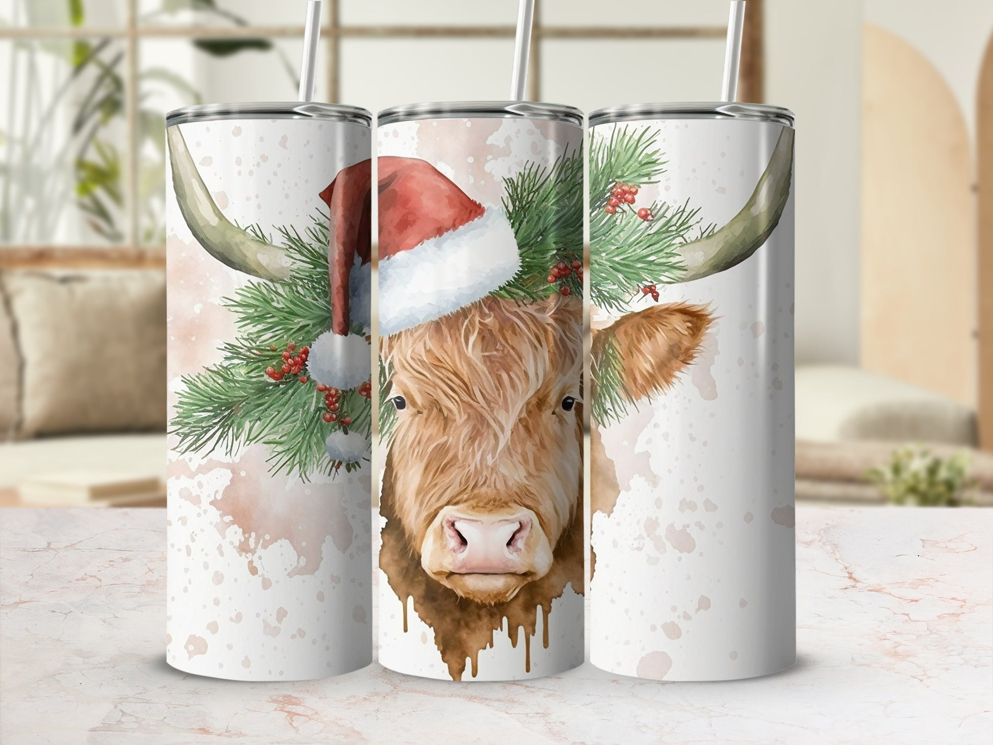 Highland cow wearing Santa hat with pine sprigs and berries on a tumbler.