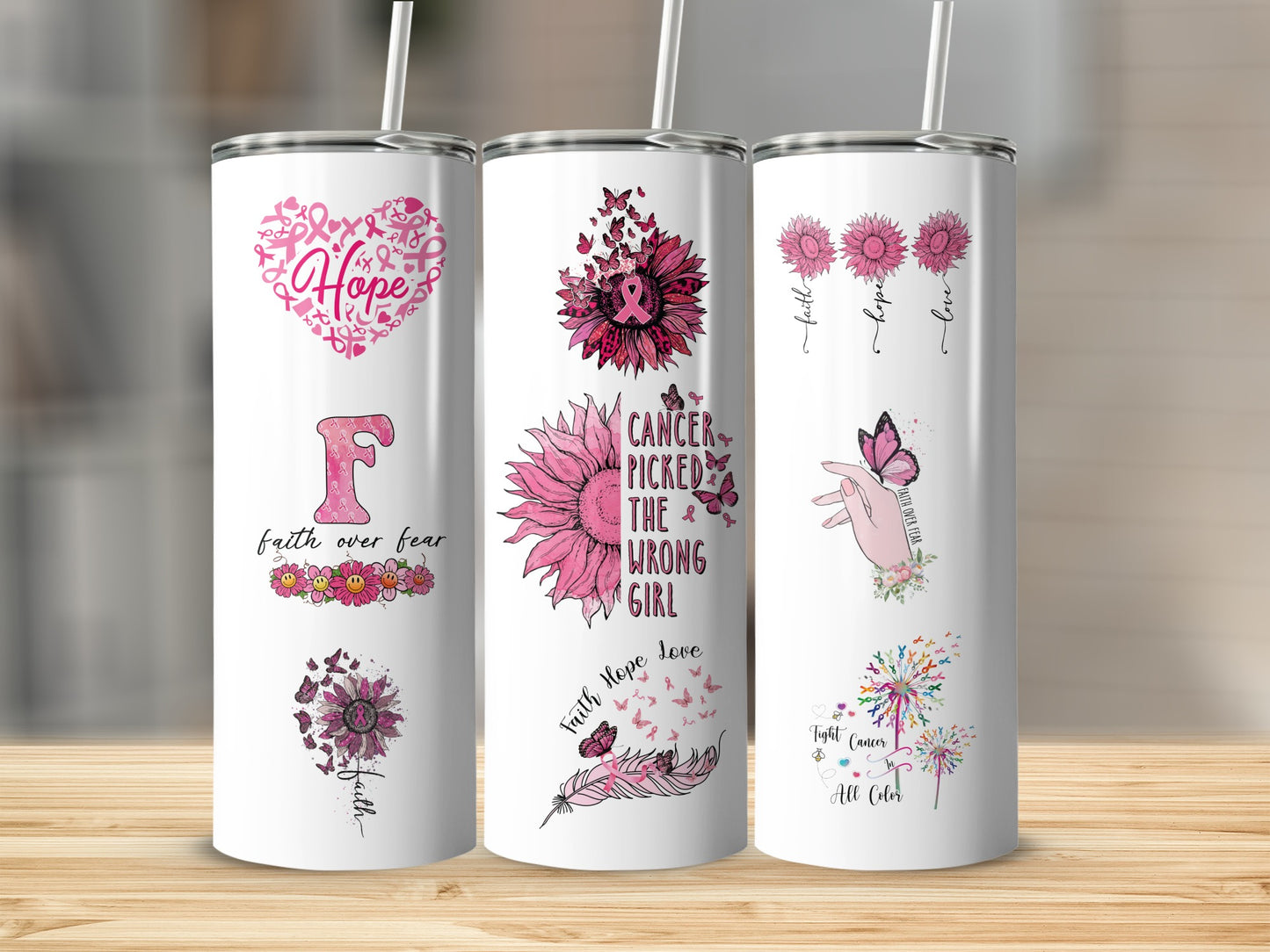 Three pink-themed tumblers with cancer awareness ribbons, flowers, and motivational text.
