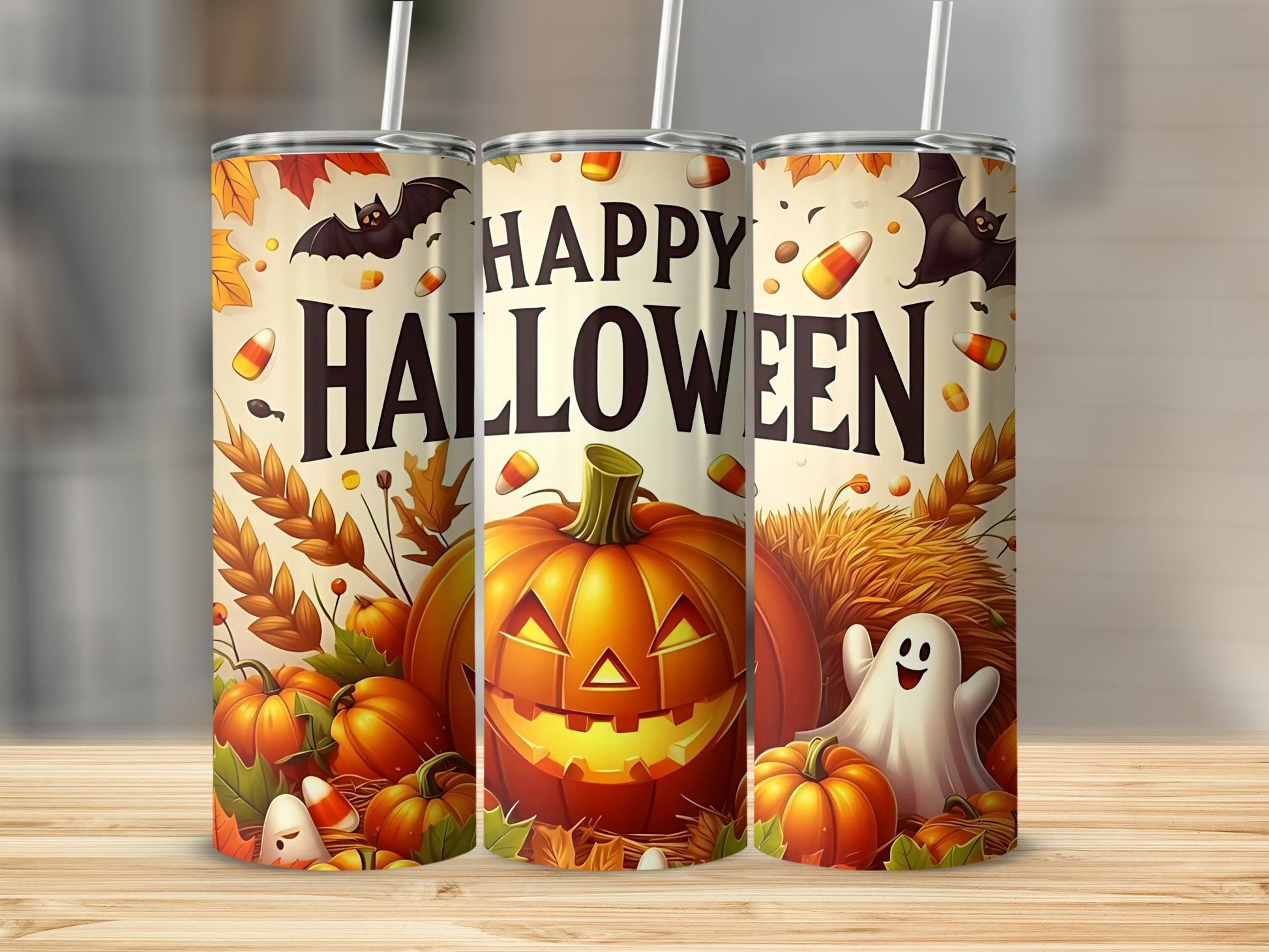 Halloween tumbler with pumpkins, bats, ghosts, candy corn, and leaves.