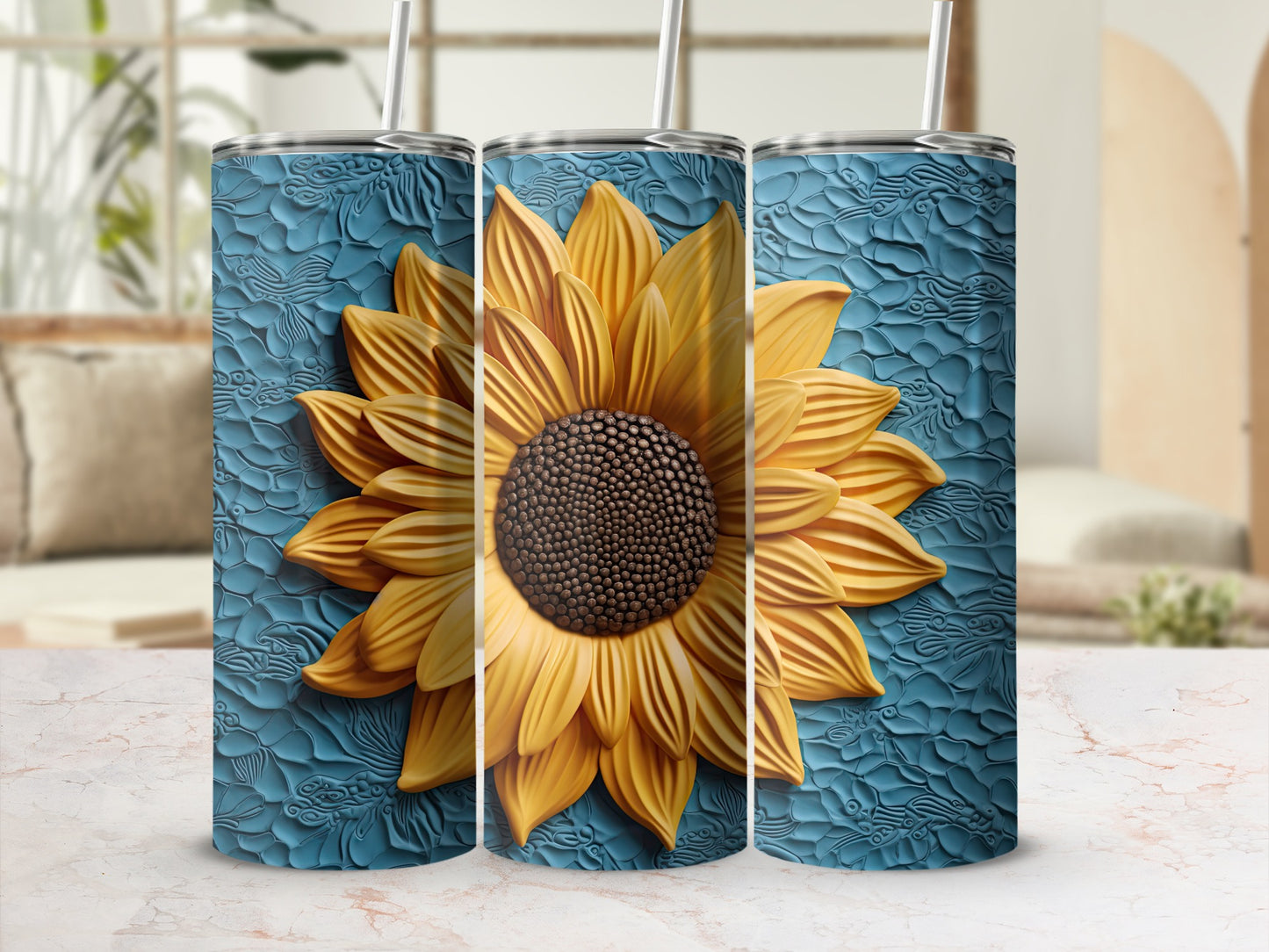 Three tumblers with textured blue wrap and a large yellow sunflower design.