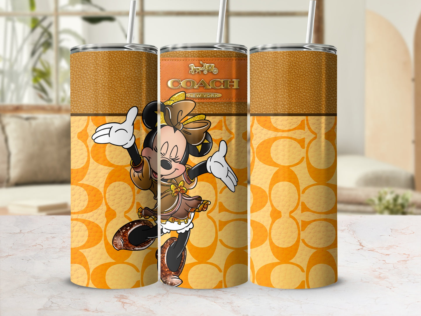 Three tumblers with Minnie Mouse, COACH logo, and CC pattern.