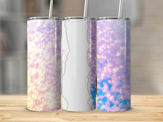 Three glitter tumblers with abstract patterns and torn paper effect.