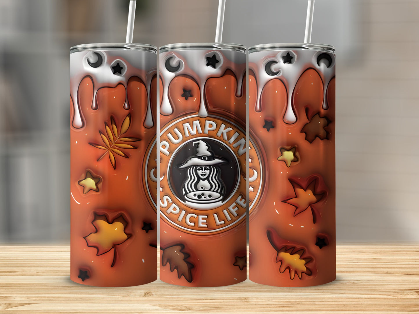 Orange tumbler with "Pumpkin Spice Life" text and autumn leaves.