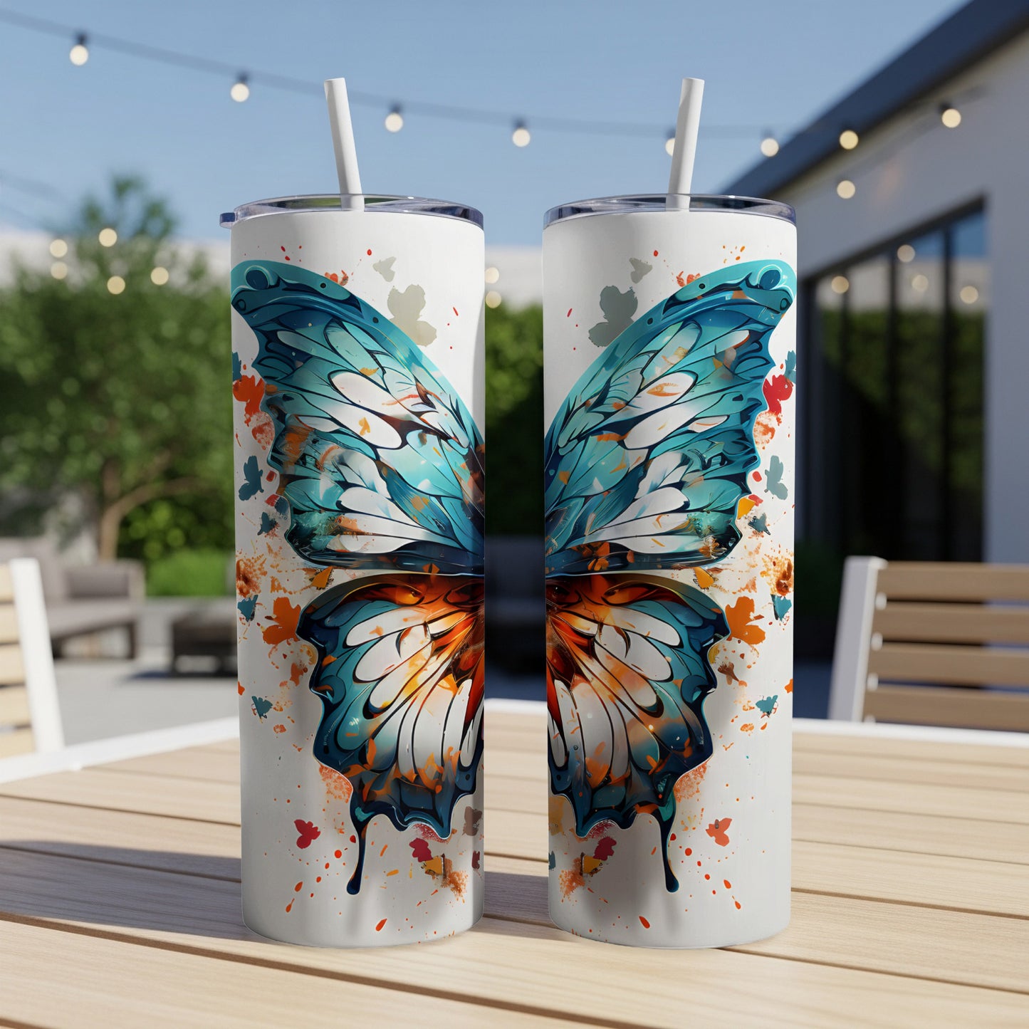 Two tumblers with a blue and orange butterfly wing design.