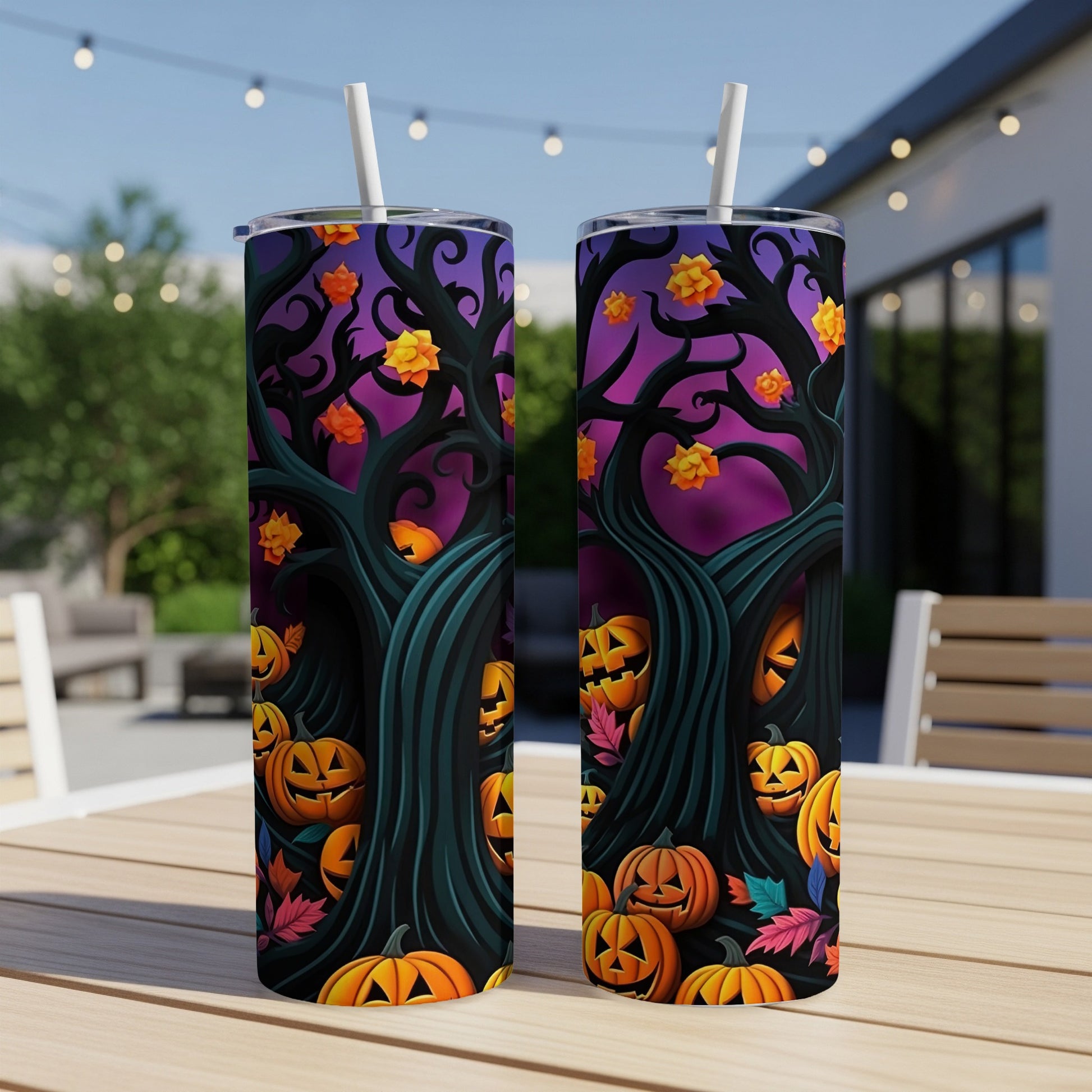 Two Halloween-themed tumblers with jack-o'-lanterns and spooky trees.