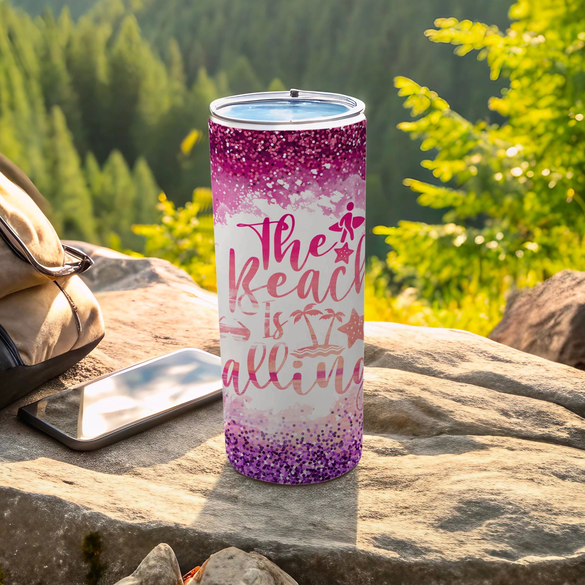 Pink glitter tumbler with "The Beach is Calling" text and palm trees.
