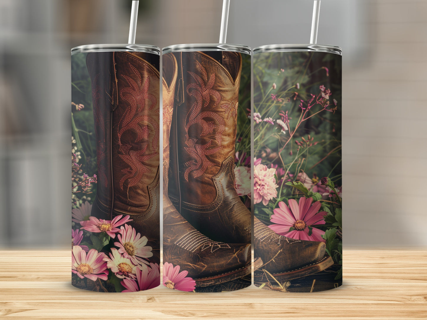 Brown cowboy boots with pink stitching and flowers.