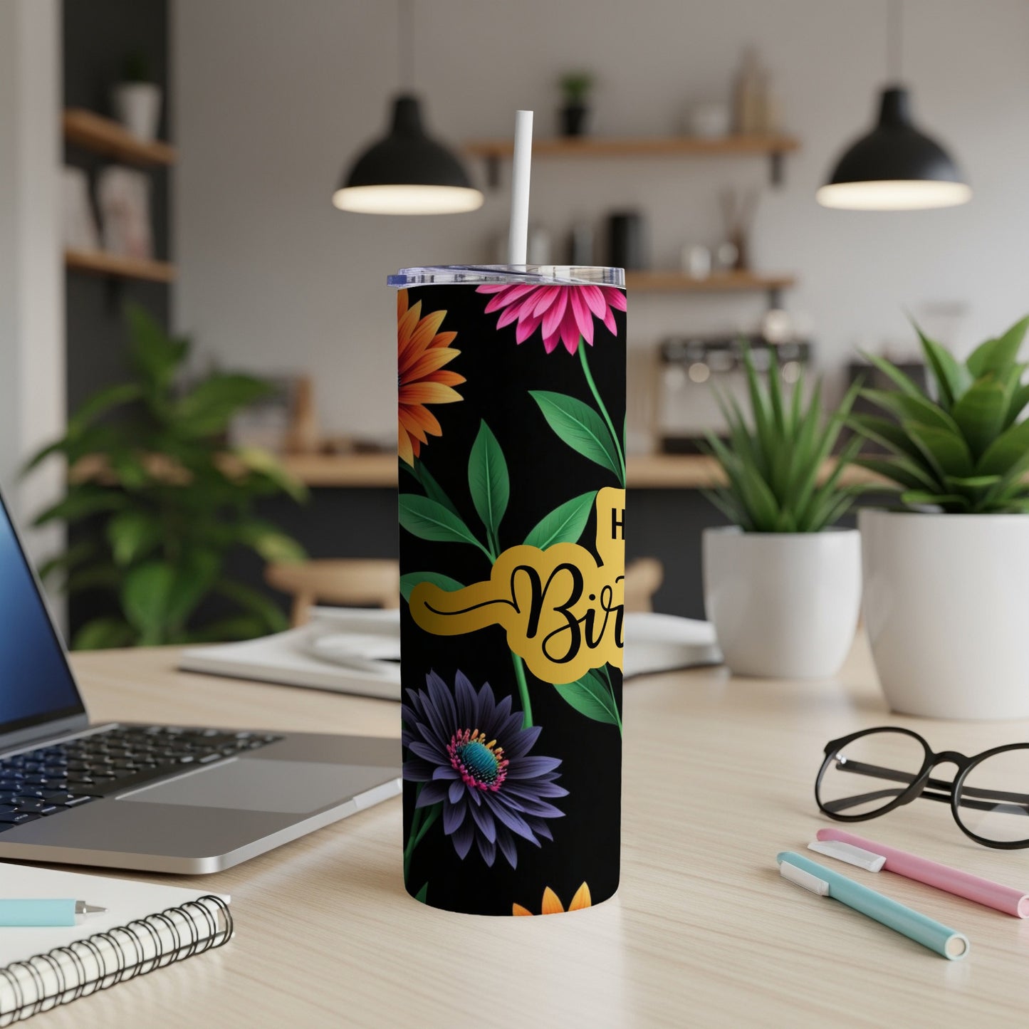 Black tumbler with colorful flowers and "Happy Birthday" text.
