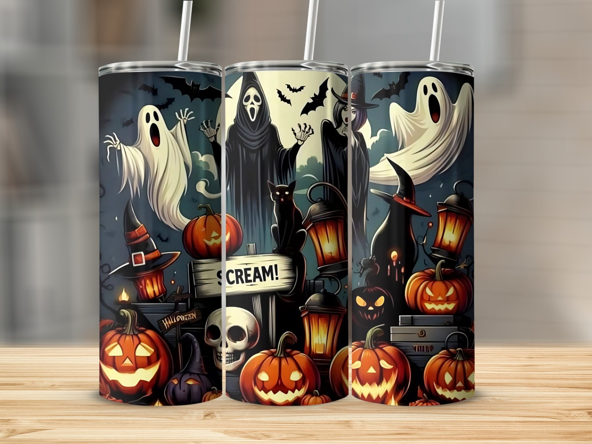 Halloween themed tumblers with ghosts, pumpkins, bats, witches, and a skull.