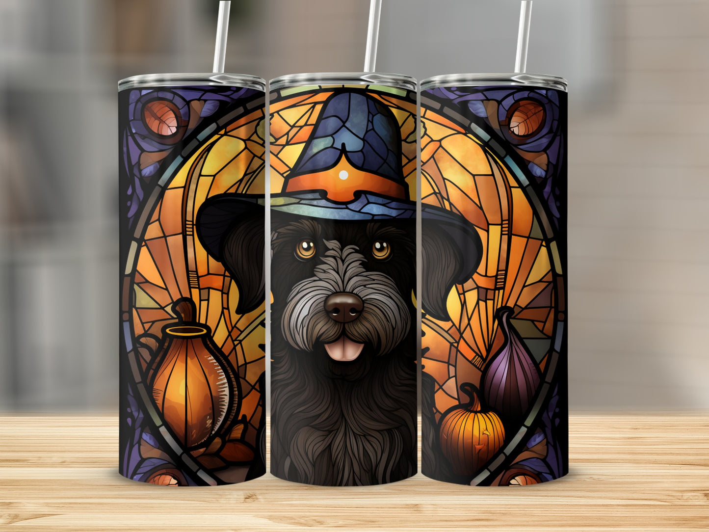 Black dog wearing witch hat on Halloween-themed stained glass tumbler.