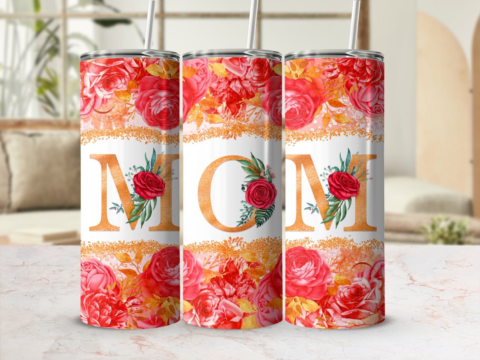 Three tumblers with "MOM" in large gold letters surrounded by red roses and glitter.