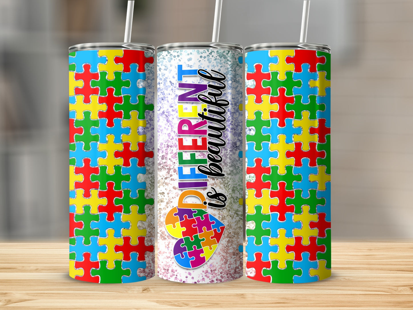 Tumbler with colorful puzzle pieces and "DIFFERENT is BEAUTIFUL" text.