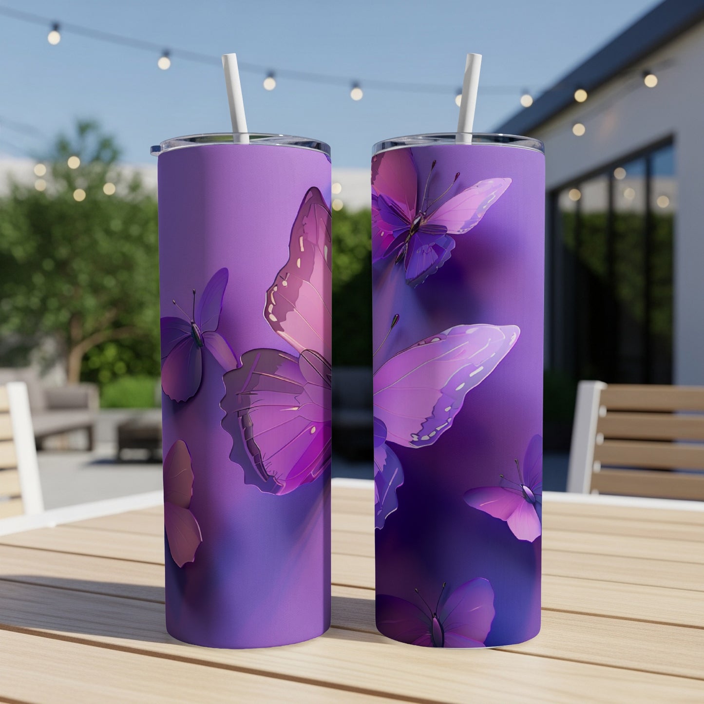 Purple tumblers with pink and purple butterflies on a wooden table.