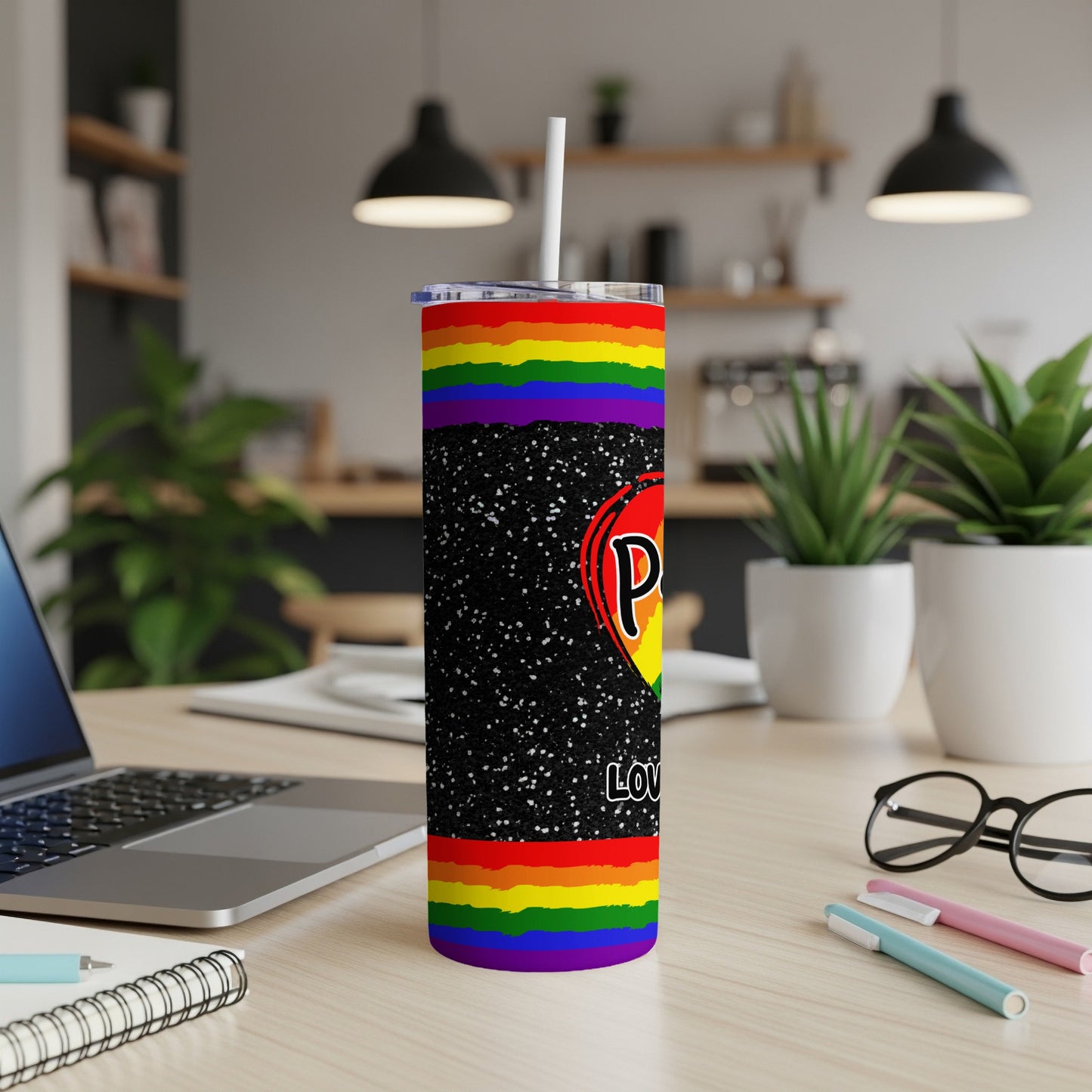 Rainbow pride tumbler with glitter and "Pride Love" text.