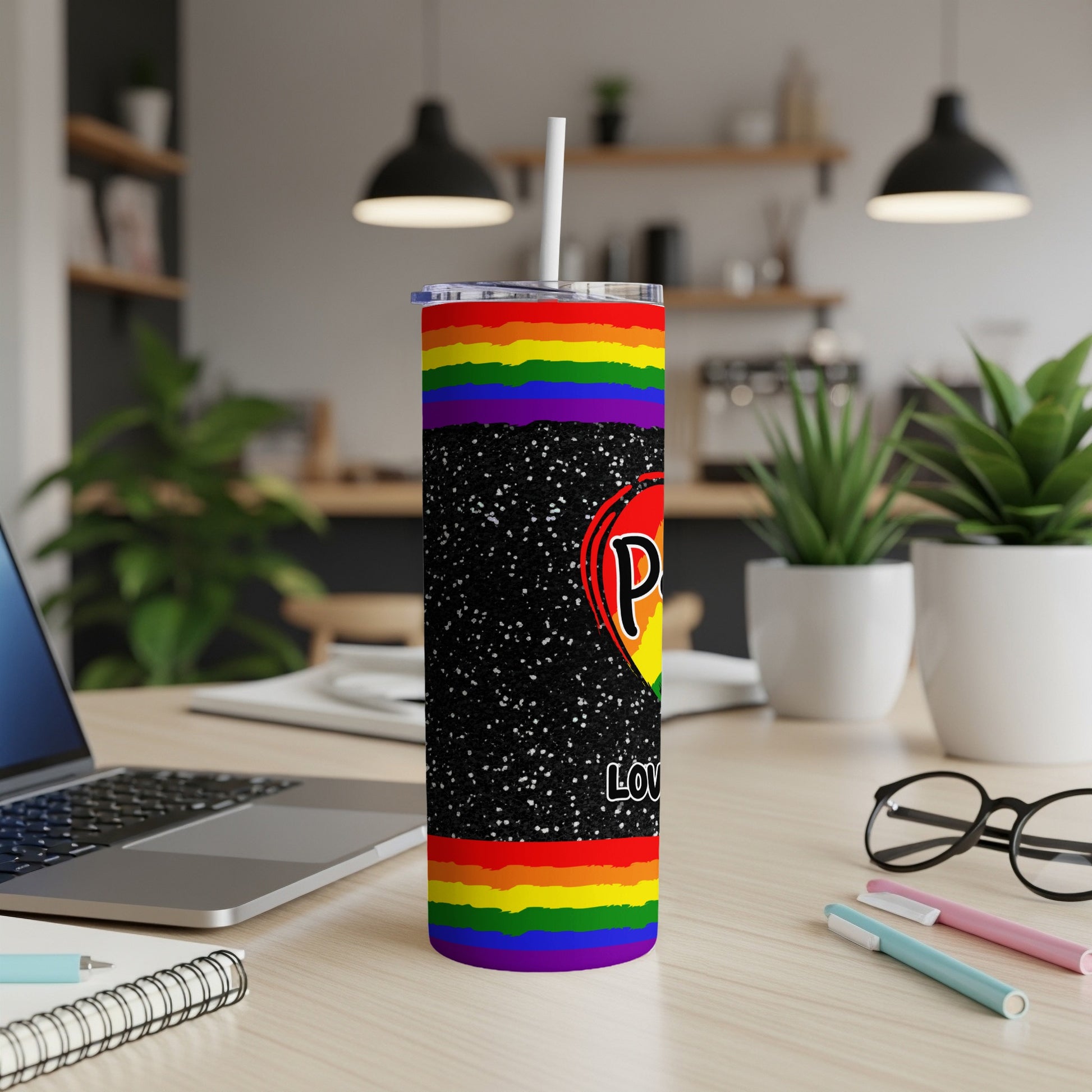 Rainbow pride tumbler with glitter and "Pride Love" text.