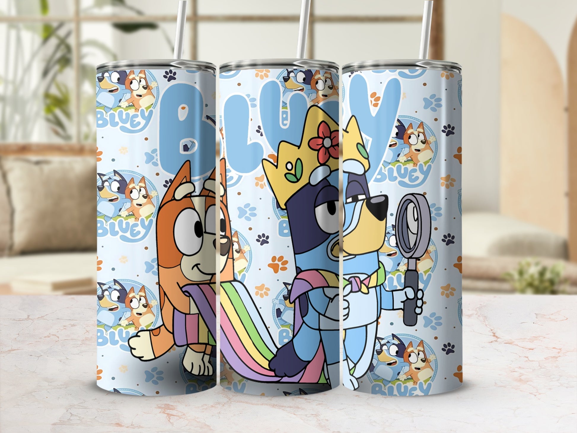 Bluey and Bingo characters on a tumbler with rainbow and magnifying glass.