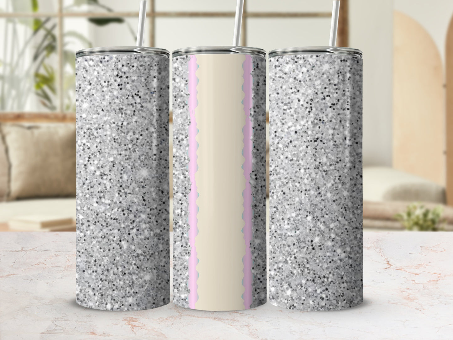 Three glitter-covered tumblers with a pink and beige scalloped design.