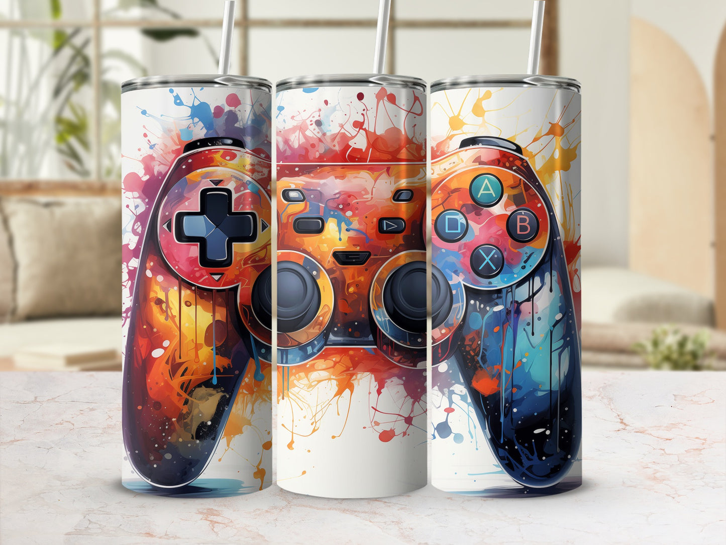 Three video game controllers with colorful paint splatter designs.