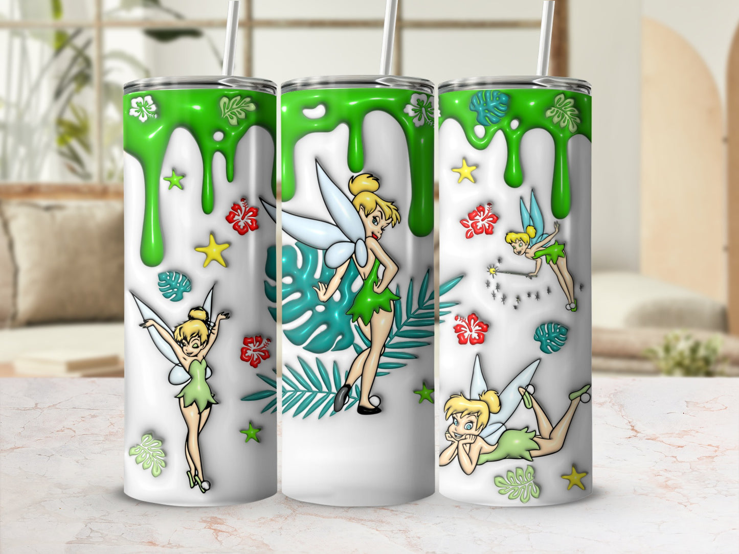 Tinkerbell fairies with green dripping accents and floral designs on white tumblers.