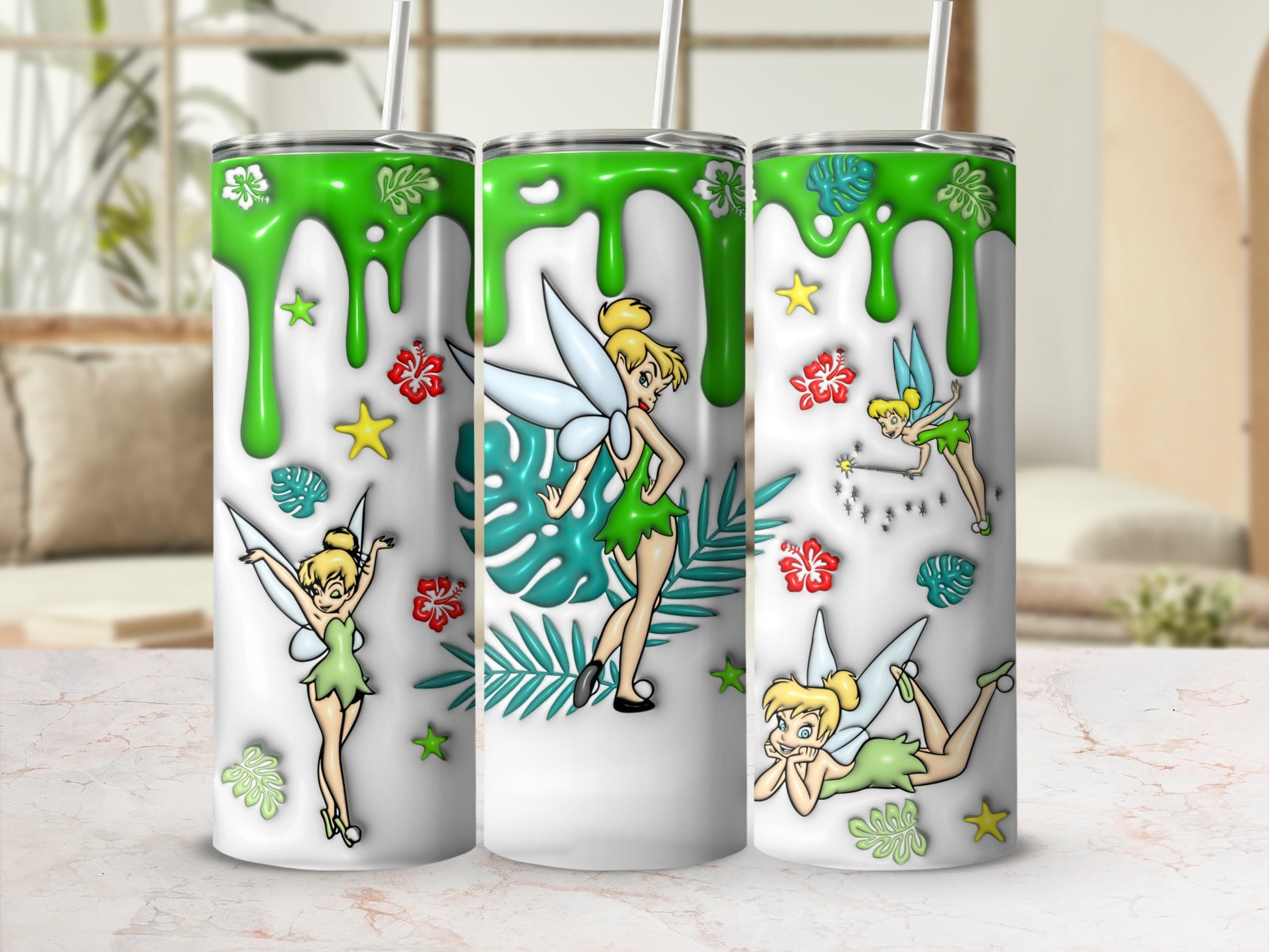 Tinkerbell fairies with green dripping accents and floral designs on white tumblers.
