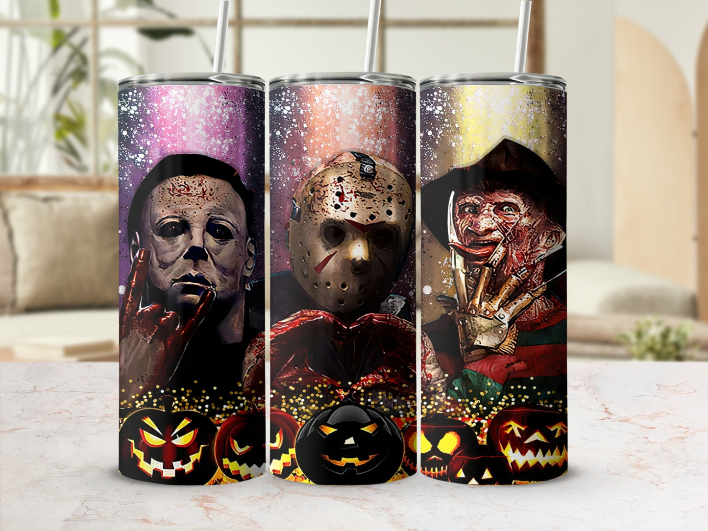 Three Halloween-themed tumblers featuring Michael Myers, Jason Voorhees, and Freddy Krueger.