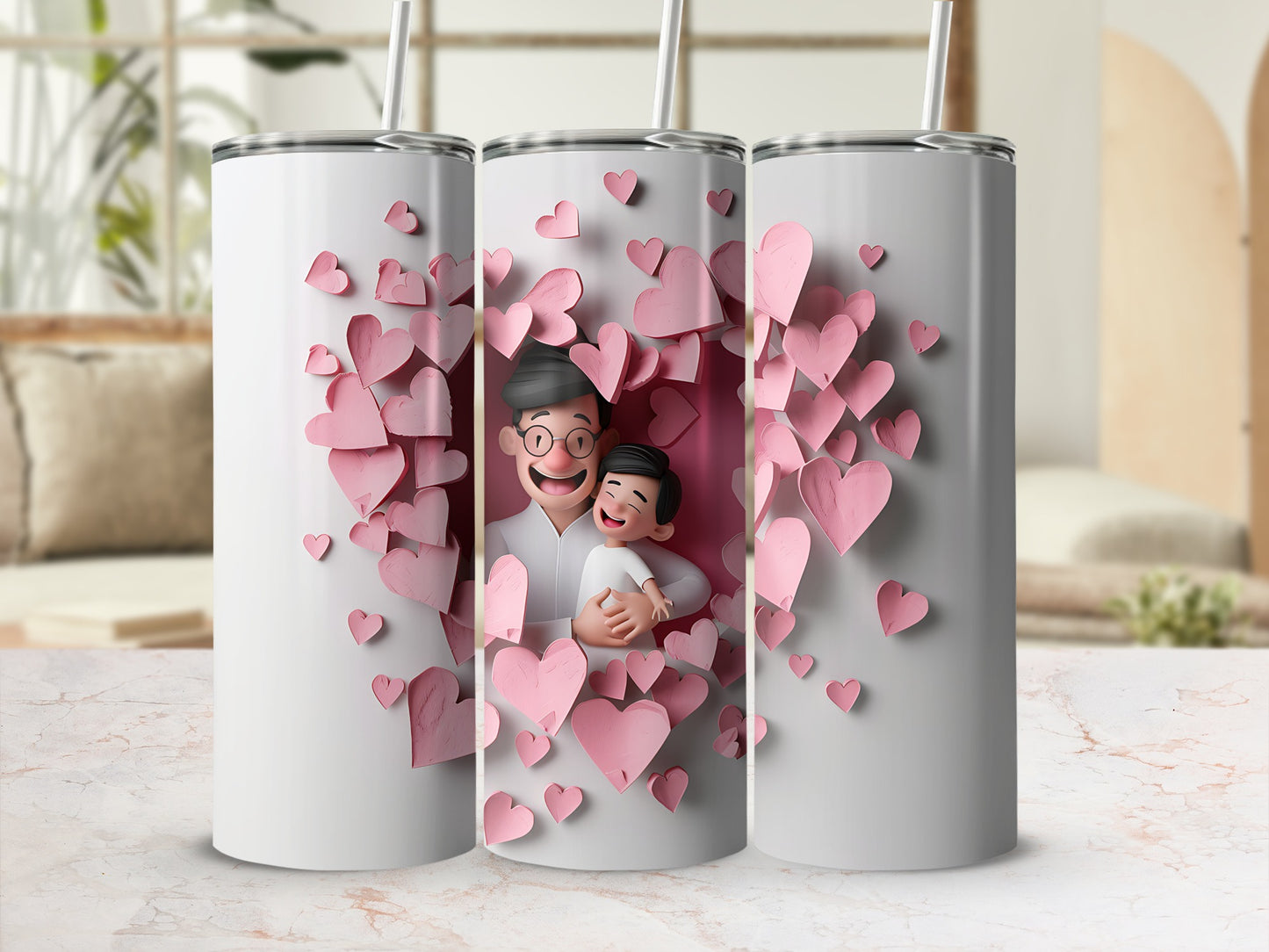Three white tumblers feature a father and son embraced amidst a shower of pink hearts.