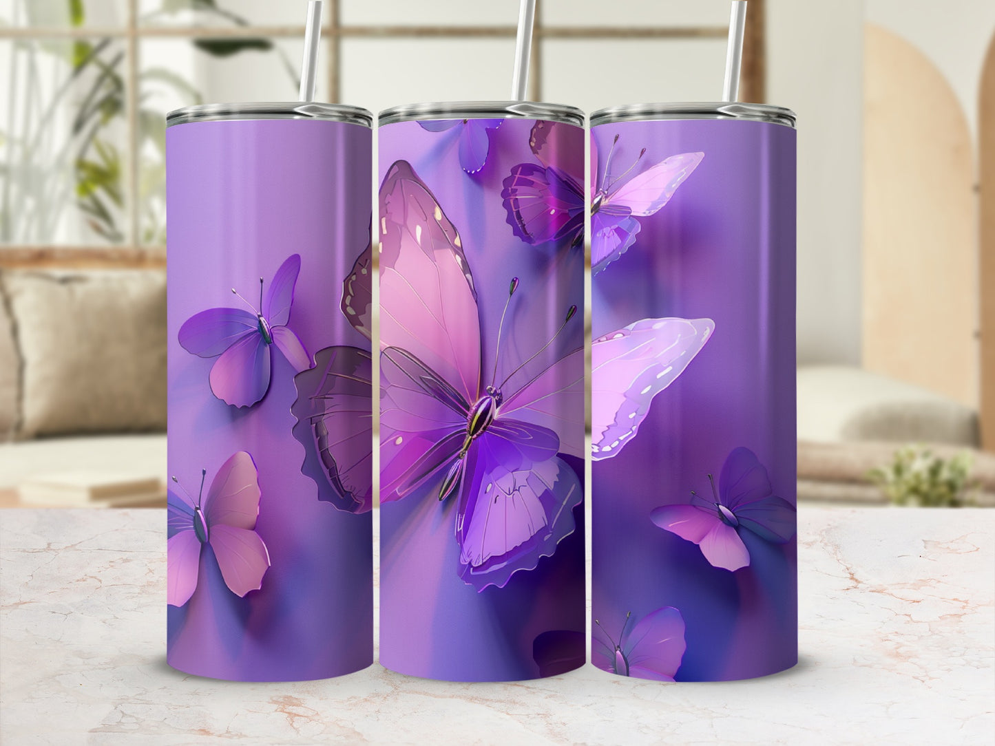 Purple tumblers with iridescent butterflies, displayed on a marble countertop.