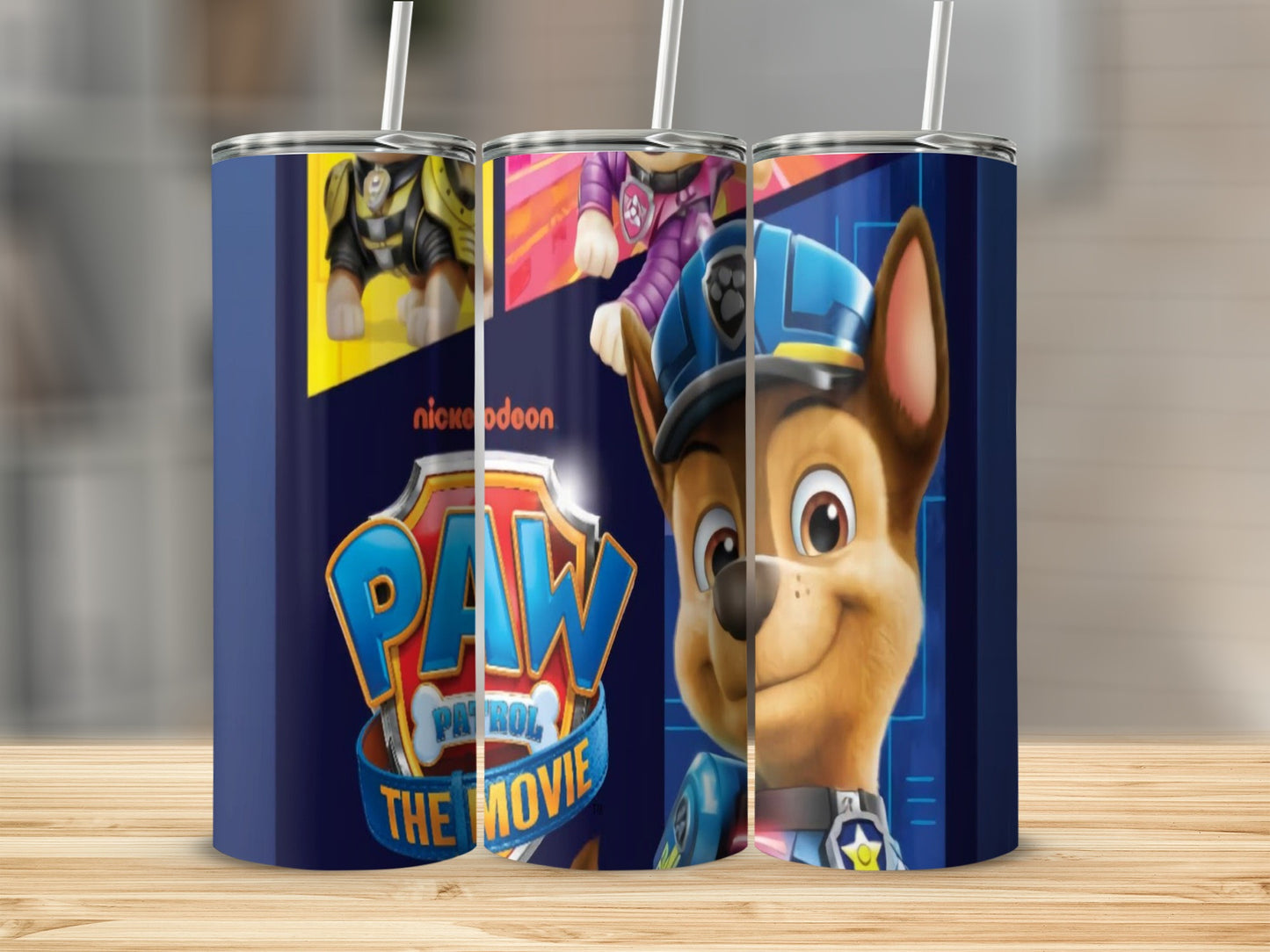 Paw Patrol The Movie Chase character on a navy blue tumbler.