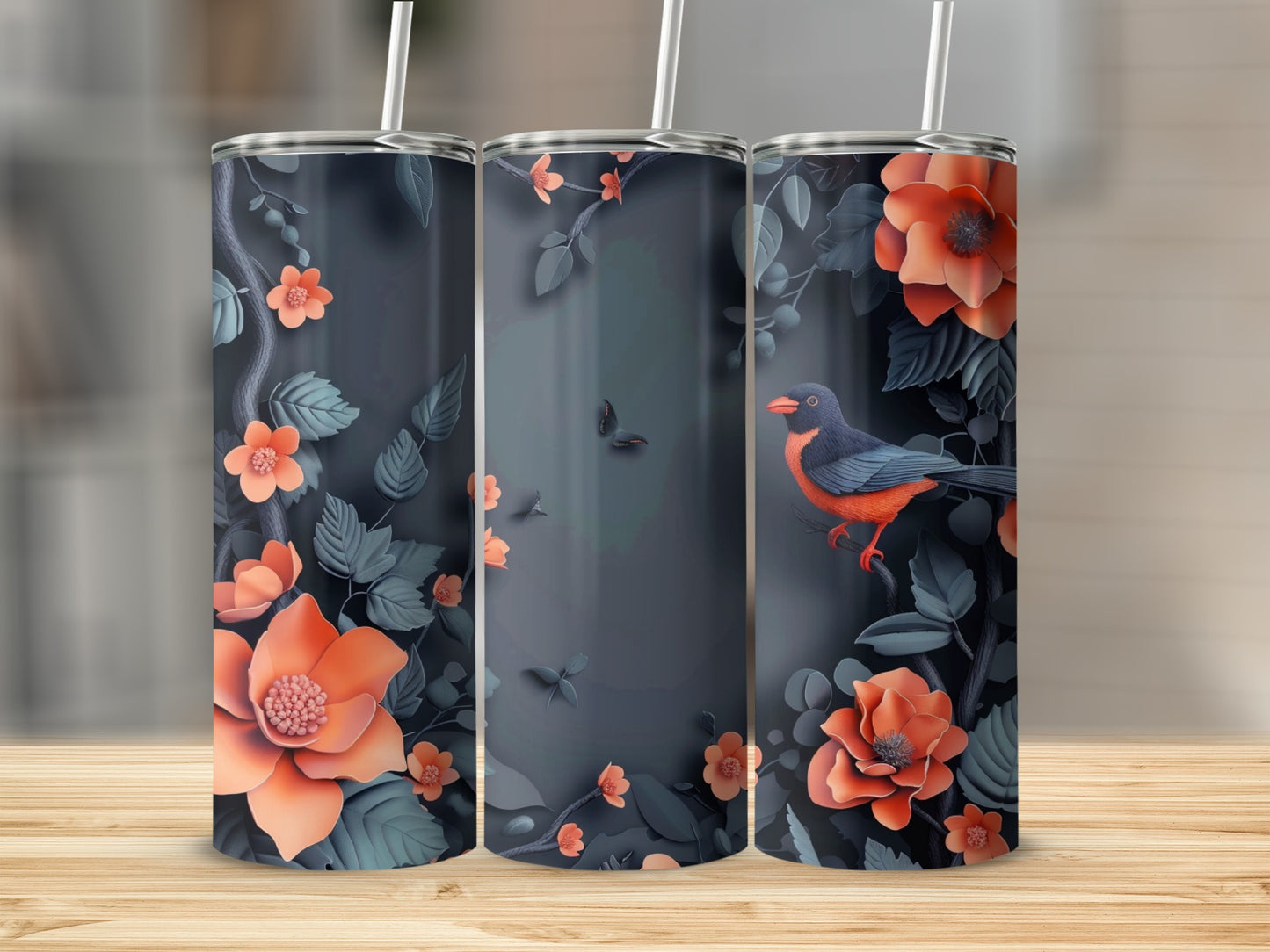 Three tumblers with orange flowers, green leaves, and a bird on a dark background.